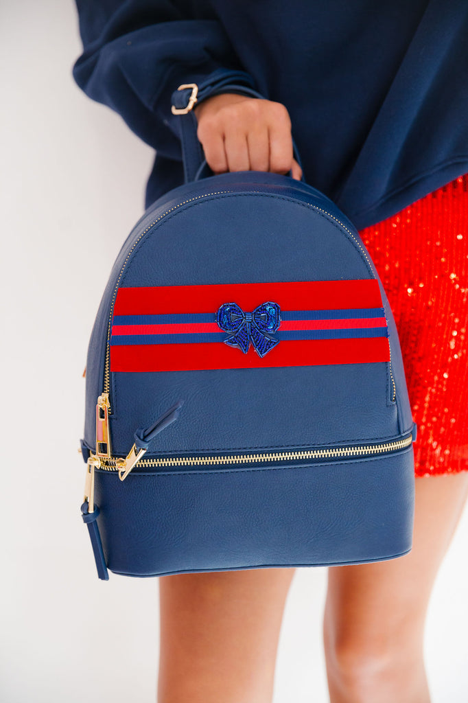 HOLIDAY BOW NAVY BACKPACK BACKPACK Judith March   