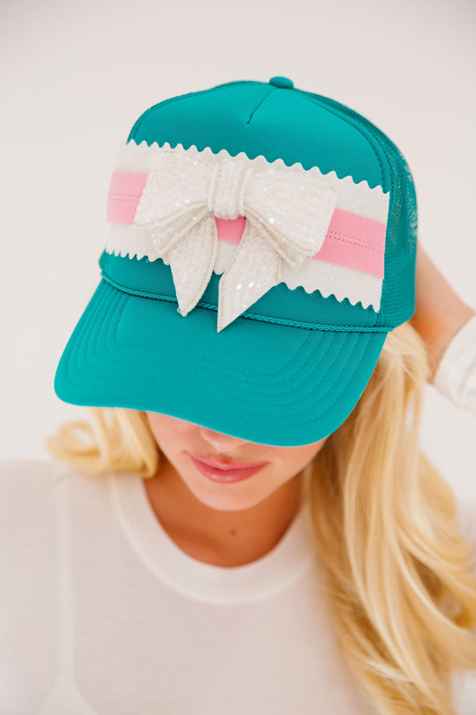 PUT A BOW ON IT TRUCKER HAT HAT Judith March